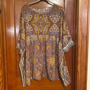 This is a womens 2XL top from Shein. Is quite large more like 4X. New in package